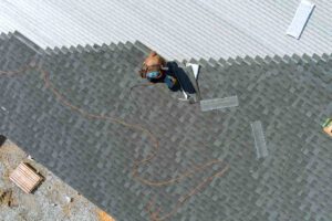 Storm-damaged roof repair service in Bowling Green, KY